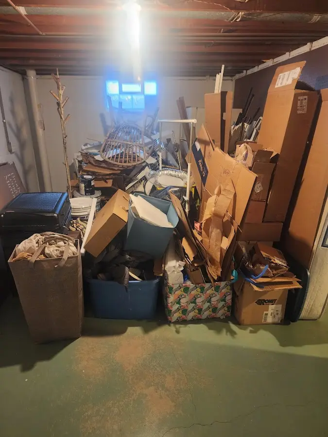 Roll-off dumpster container at job site for 15 Yard Dumpster Rental in Cumming